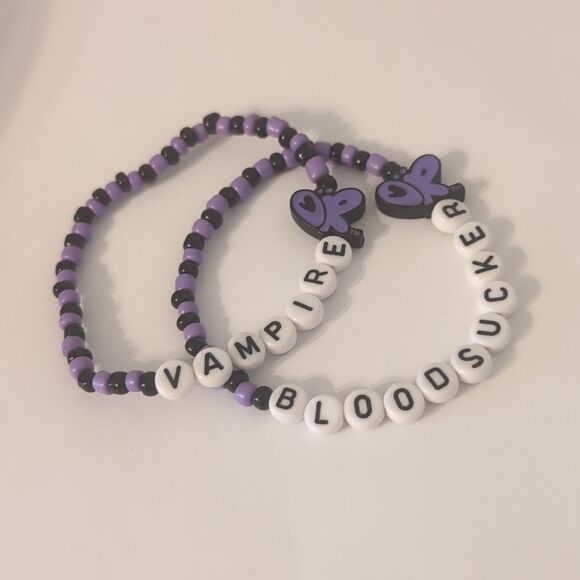 Set of 2 Olivia Rodrigo Handmade Purple Black and White Beaded Stretch Bracelets - Picture 1 of 4